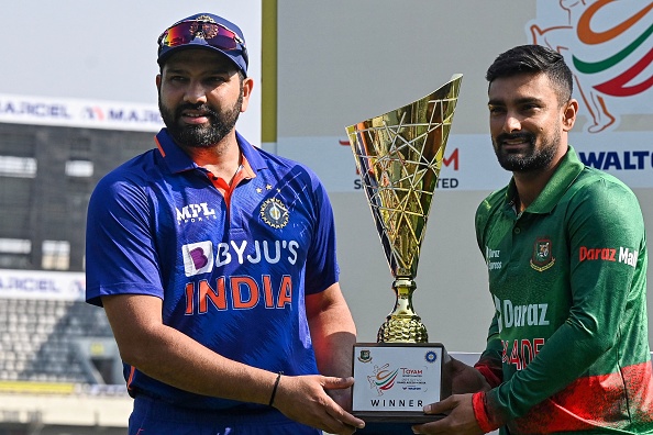 Rohit Sharma and Liton Das pose with the ODI trophy | Getty Images