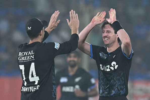 Matt Henry celebrates a wicket with Mitchell Santner | Getty
