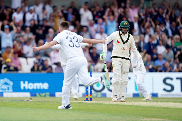 Mark Wood celebrates after flattening Khawaja's leg stump | Getty