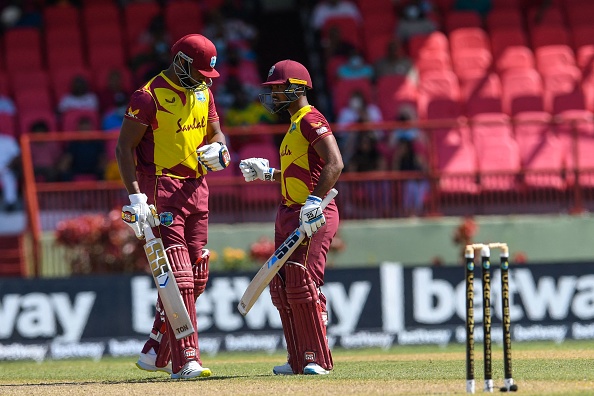 Kieron Pollard (L) and Nicholas Pooran (R) during the chase in 2nd T20I | Getty