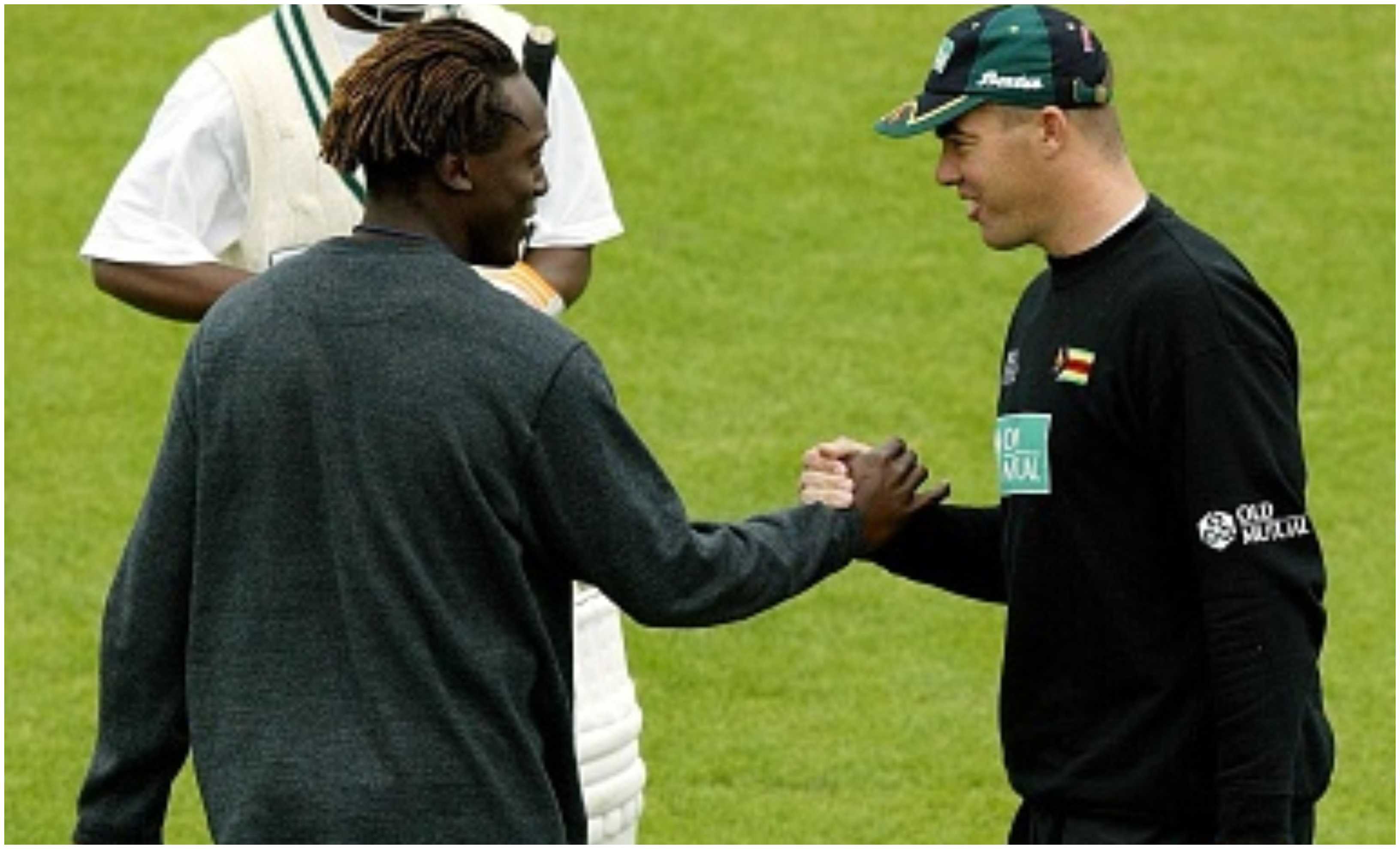 Henry Olonga and Heath Streak | Getty