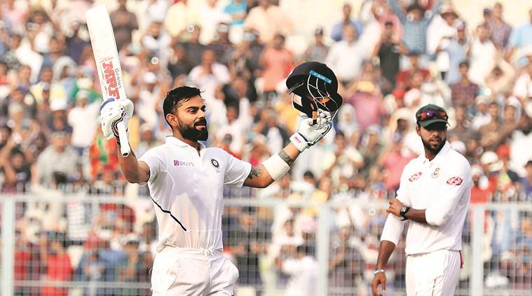 Virat Kohli became the first Indian to score a hundred in day night Test cricket. (photo - AFP)