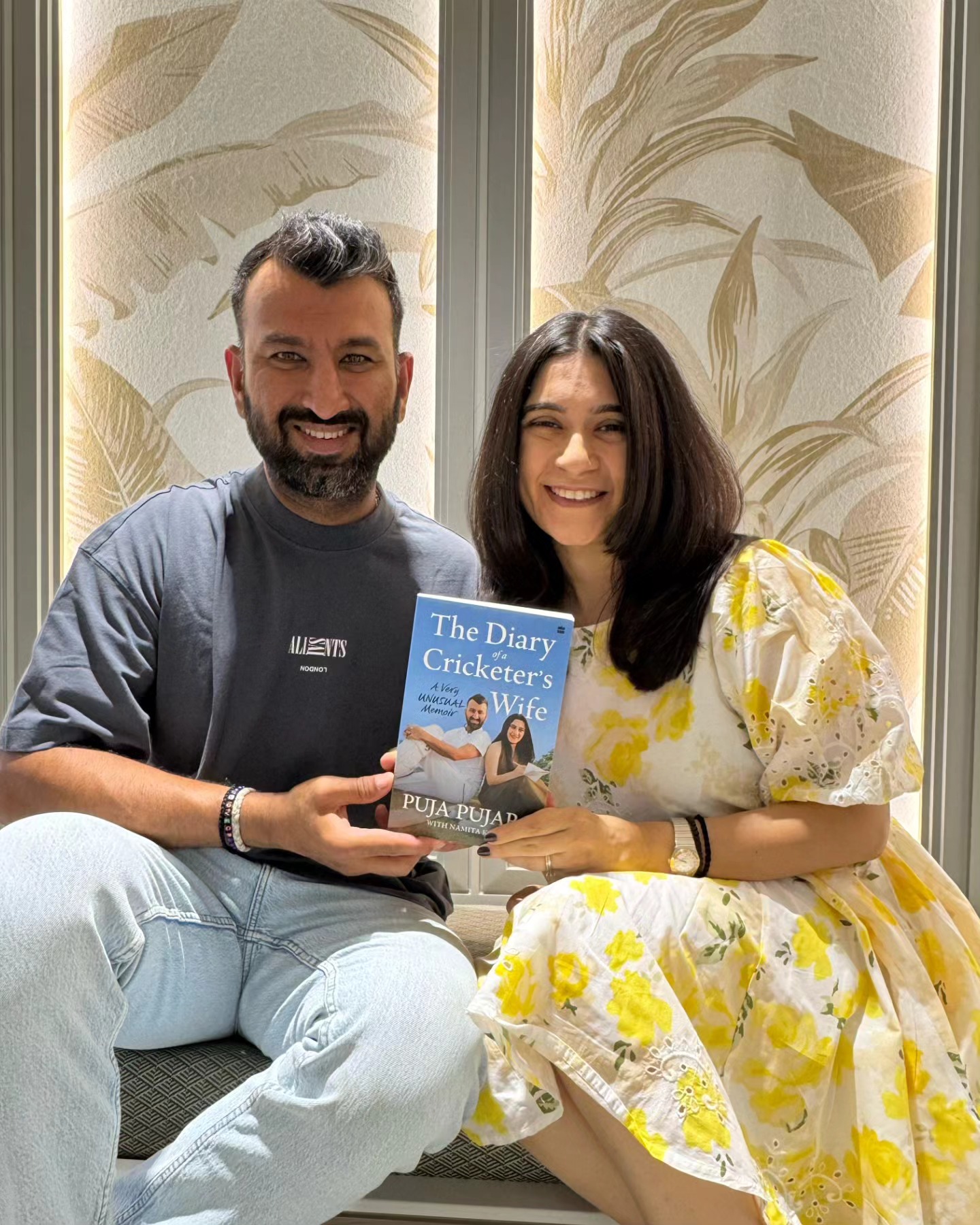 Cheteshwar Pujara with wife Puja and her book | Instagram