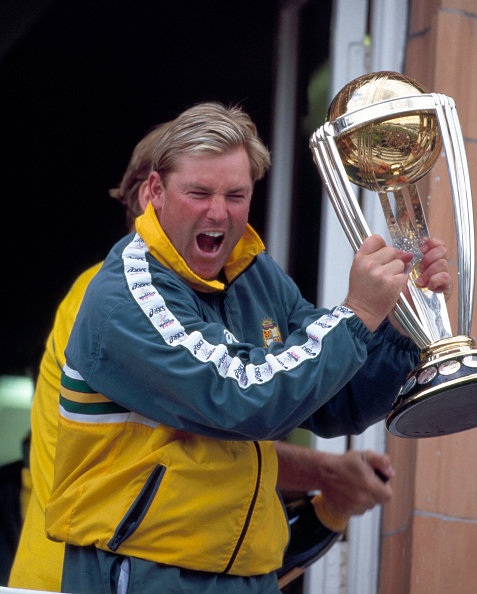 Shane Warne with the World Cup trophy in 1999 | Getty