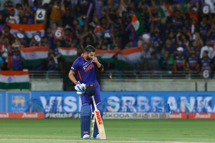 Virat Kohli kissing his jersey after scoring fifty against Pakistan | Getty Images