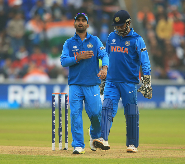 Dinesh Karthik and MS Dhoni | Getty