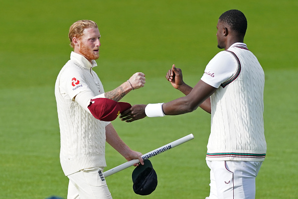 Ben Stokes and Jason Holder | Getty