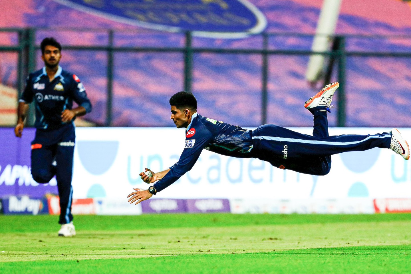 Shubman Gill completing an excellent diving catch to remove Evin Lewis | IPL-BCCI