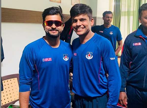 Priyam with his senior UP batsman suresh Raina | Facebook