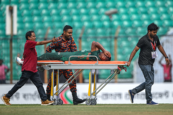 Stretcher was brought in to take Mustafizur Rahman off the field | Getty