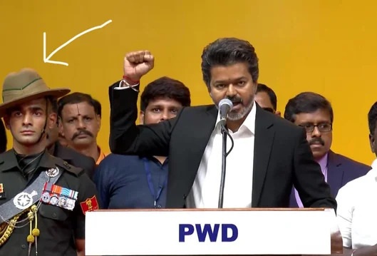 A security personal resembling Anshul Kamboj during Vijay's TN CM oath ceremony | X