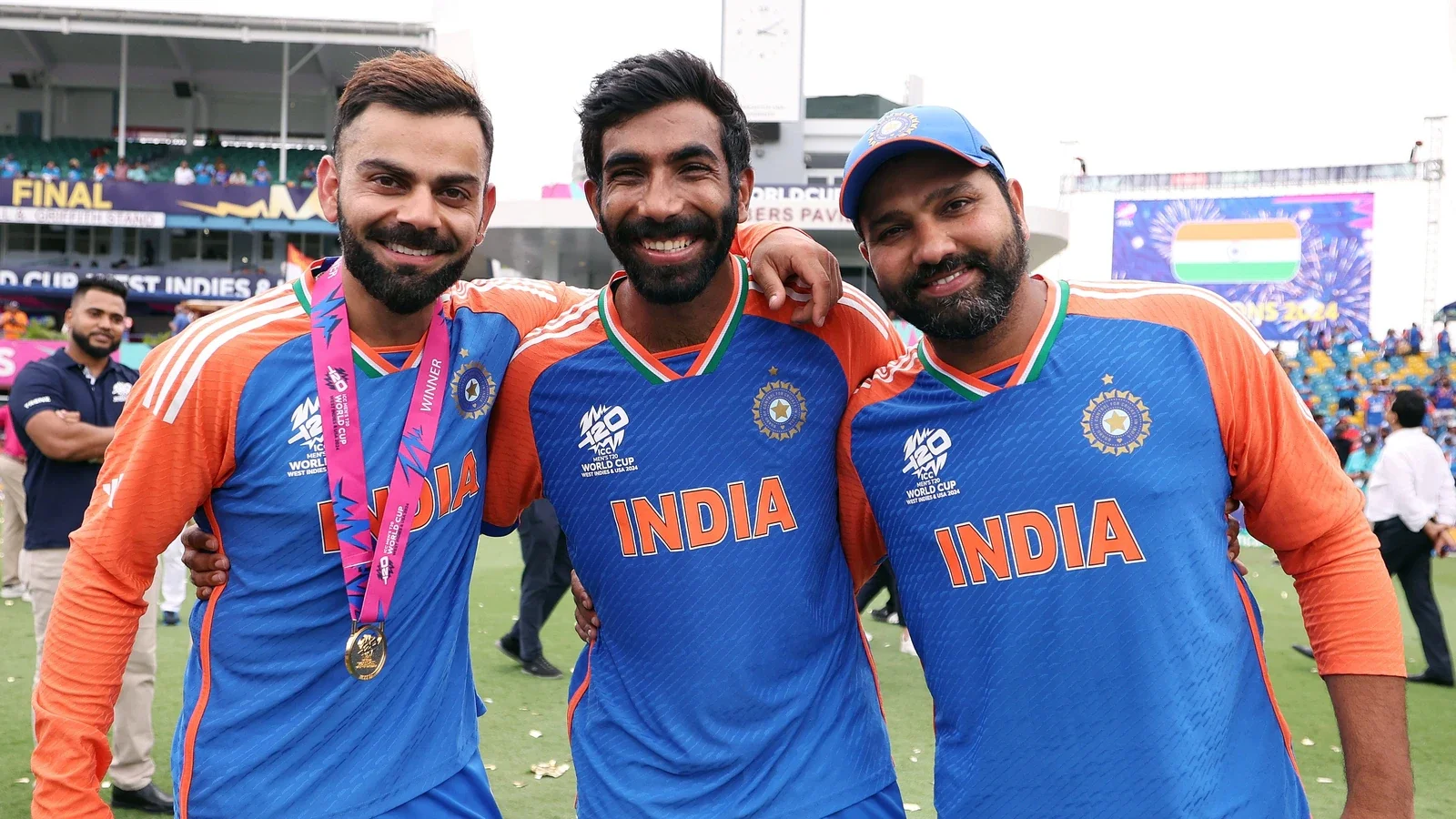 Virat Kohli and Rohit Sharma with Jasprit Bumrah | Getty