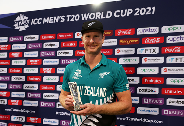 Jimmy Neesham poses with Player of the Match award | Getty Images