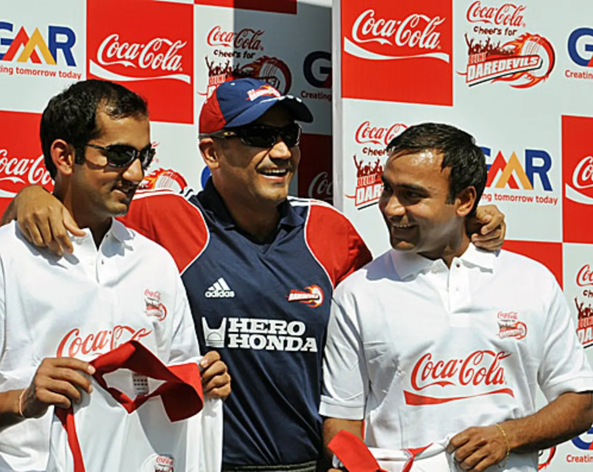 Gambhir and Mishra with Virender Sehwag | AFP