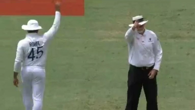 AUS v IND 2020-21: WATCH – Rohit Sharma raises his finger alongside umpire Paul Wilson to give David Warner out