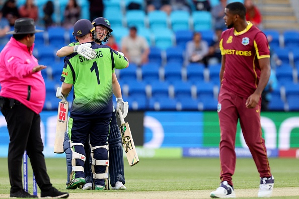 Ireland's Paul Stirling and Lorcan Tucker celebrate after hitting the winning runs | Getty