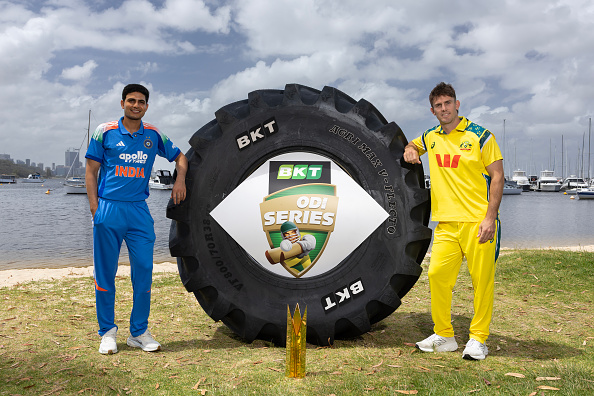 Shubman Gill and Mitchell Marsh posing with the trophy ahead of the ODI series | Getty