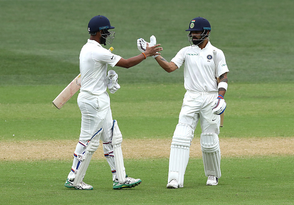 Pujara and Kohli added 71 runs to take India to 151/3 | Getty