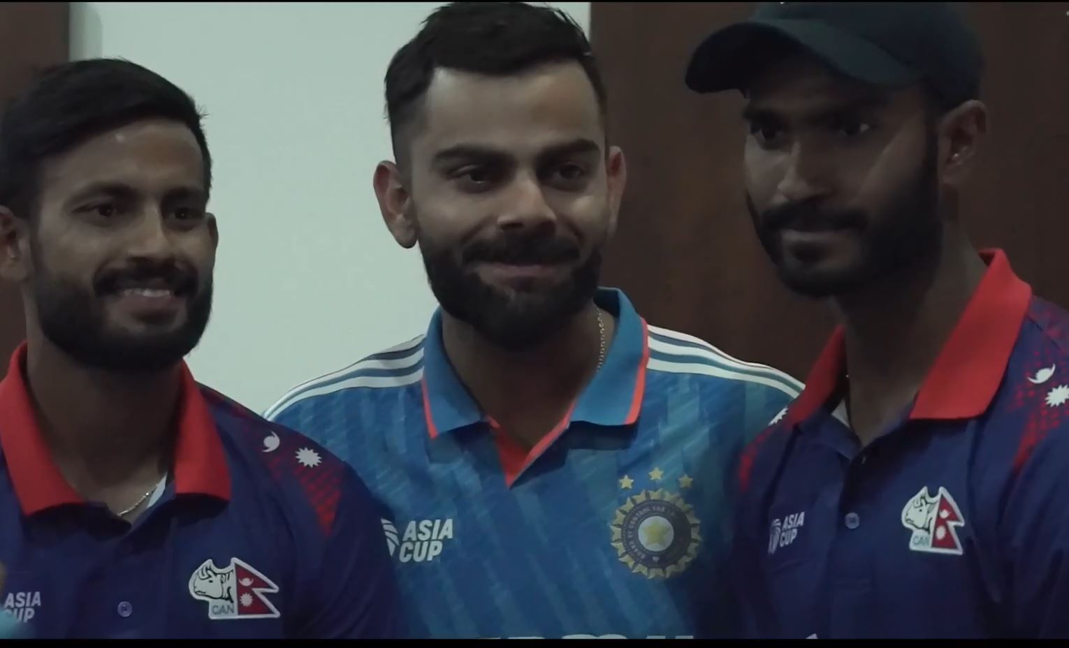 Virat Kohli poses with Nepal players after their Asia Cup match | X